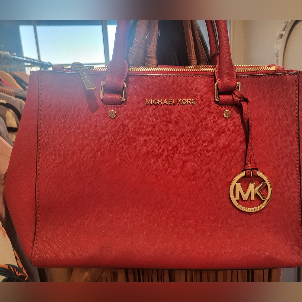 #61 Micheal  Kors red purse